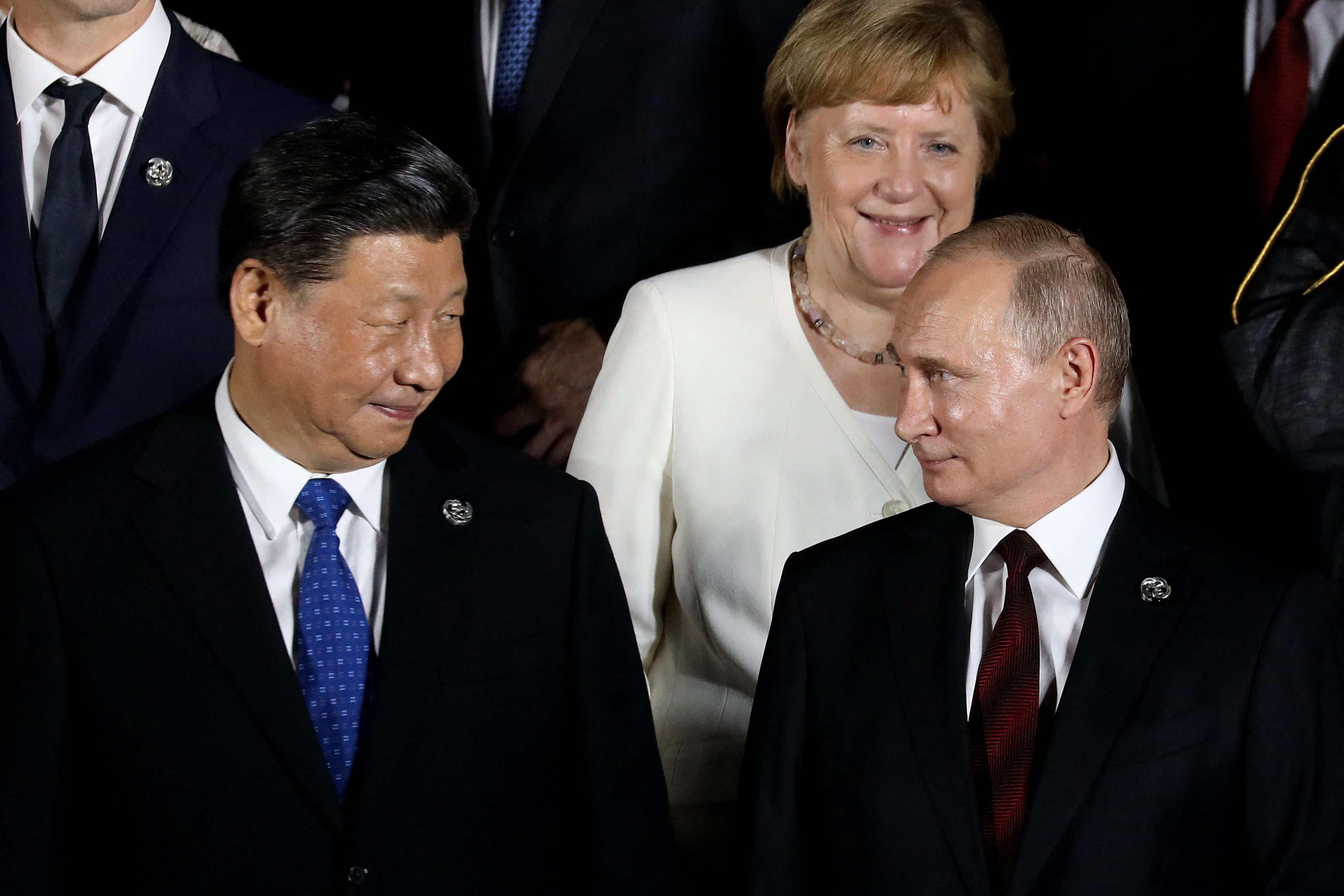 สีจิ้นผิง กับ ปูติน ระหว่างร่วมประชุม G20 ในปี 2019